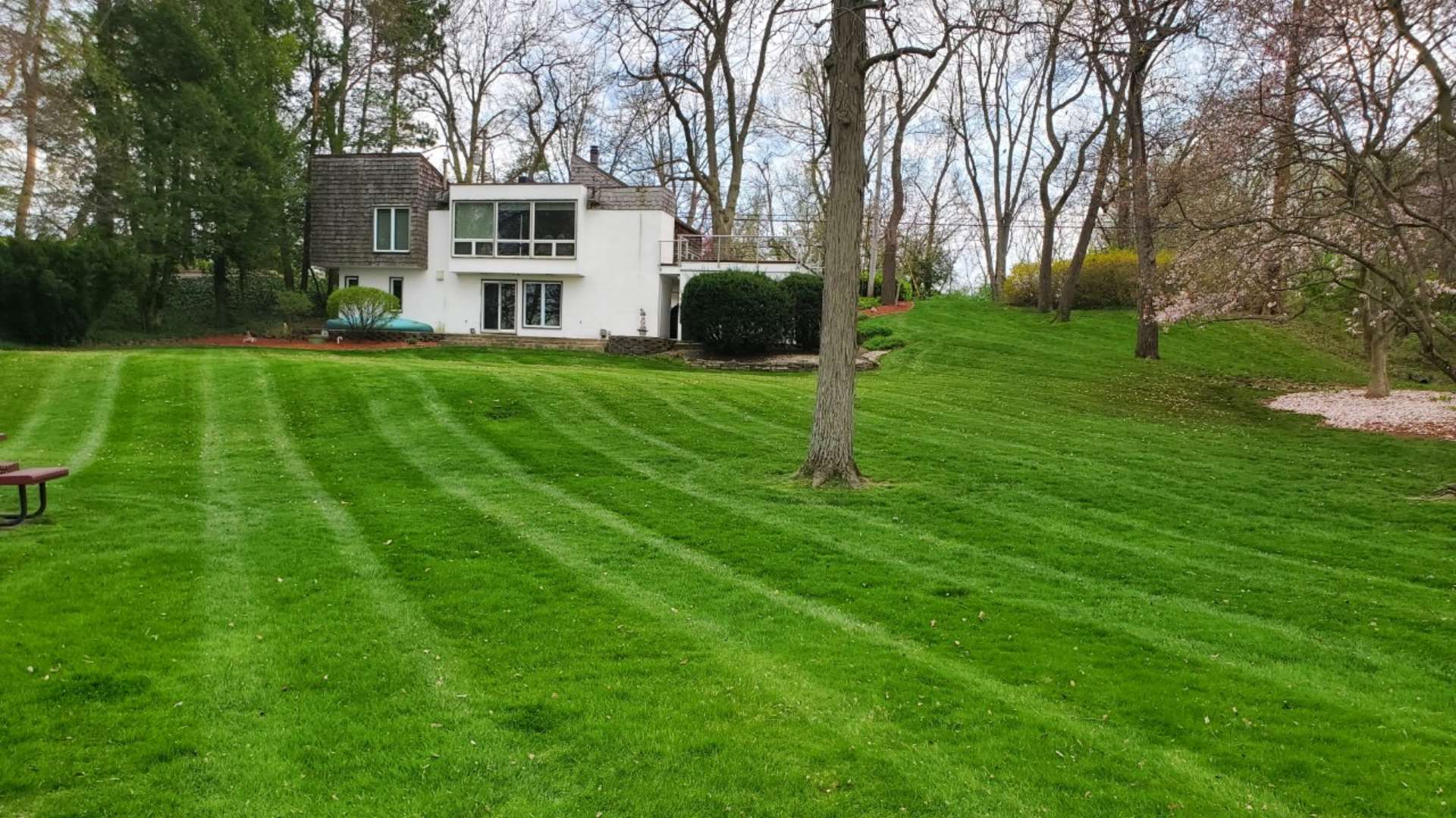 Home front with mowed lawn and patterns added in East Alton, IL.