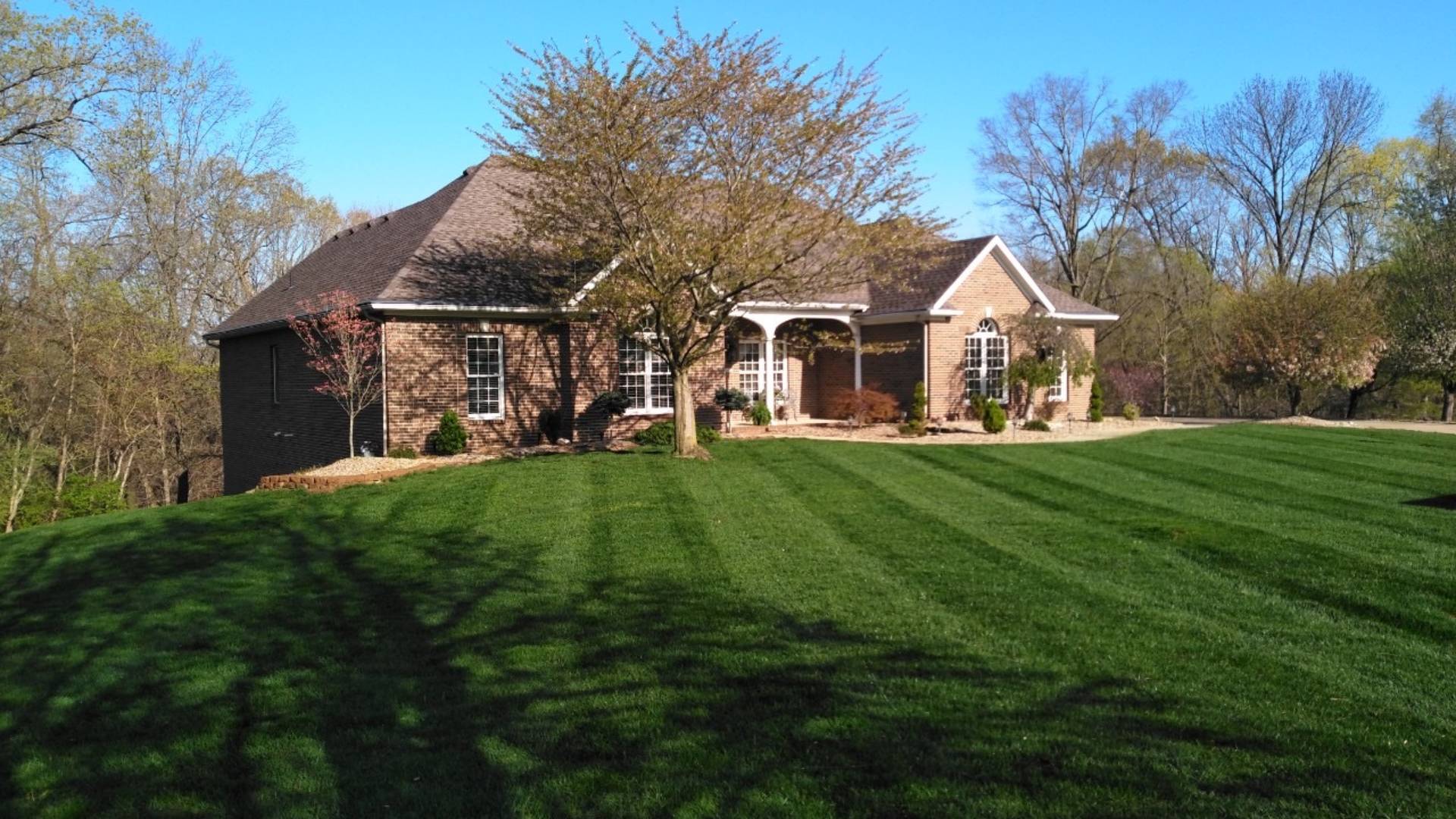 Home with freshly mowed lawn in Rosewood Heights, IL.