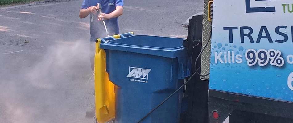 Element professional hosing down trash bin for service in Brighton, IL.